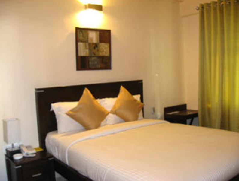 Hotel The Elite Suites Πούνε Δωμάτιο φωτογραφία