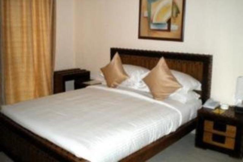 Hotel The Elite Suites Πούνε Δωμάτιο φωτογραφία