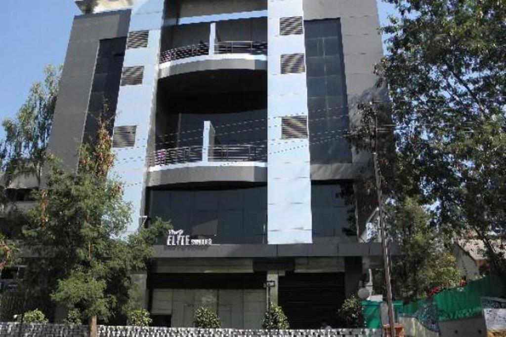 Hotel The Elite Suites Πούνε Δωμάτιο φωτογραφία
