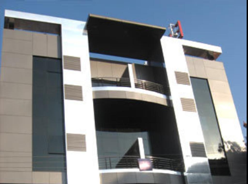 Hotel The Elite Suites Πούνε Δωμάτιο φωτογραφία