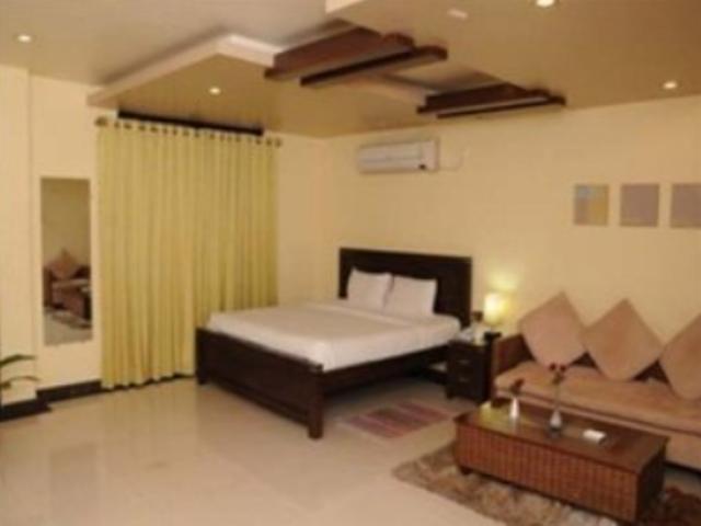 Hotel The Elite Suites Πούνε Δωμάτιο φωτογραφία